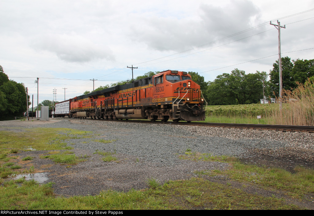 BNSF units lead a Norfolk Southern train through Westfield New York
